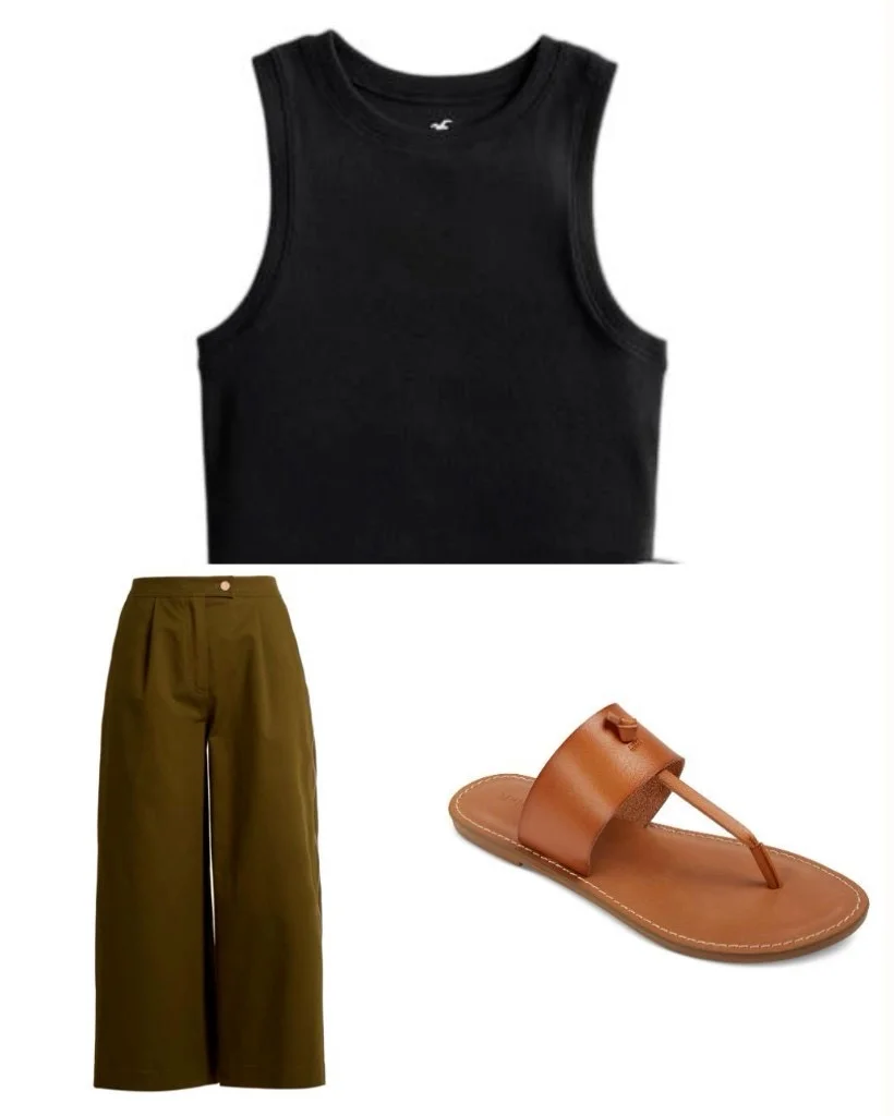 A black tank, olive trousers and tan sandal laid out as an outfit.